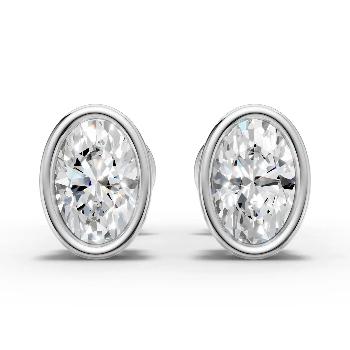 Oval Cut Diamond Bezel Stud Earrings